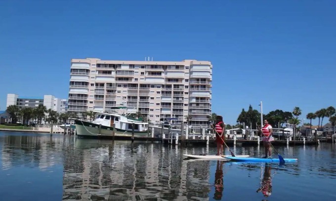 Fort Pierce Shores Condo | Cozy Beach Condo w/Workspace, Great WiFi, Paddle Boards, Canoe, Gym, Pool & Spa