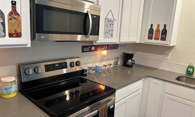 Fort Lupton House | Cozy bedroom in a townhome in Fort Lupton with AC, WiFi