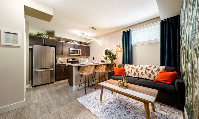 Southeast Edmonton House | Cozy Boho Jungle Themed Suite w/Double Queen Beds