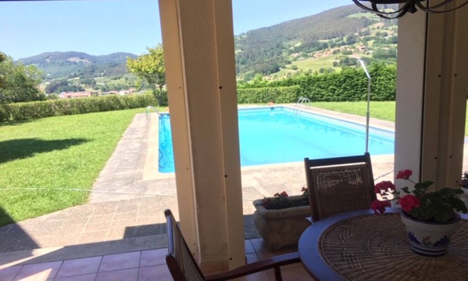 Ampuero House | Cozy Bungalow with poolside porch and beautiful views