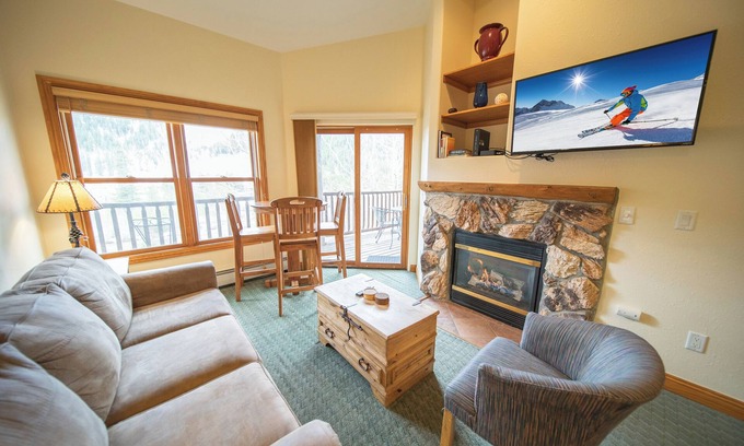 Mountain House Condo | Cozy condo with views of the snowy mountains!