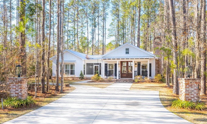 Midway Cottage | Cozy cottage nestled among nature near inner coastal waterway