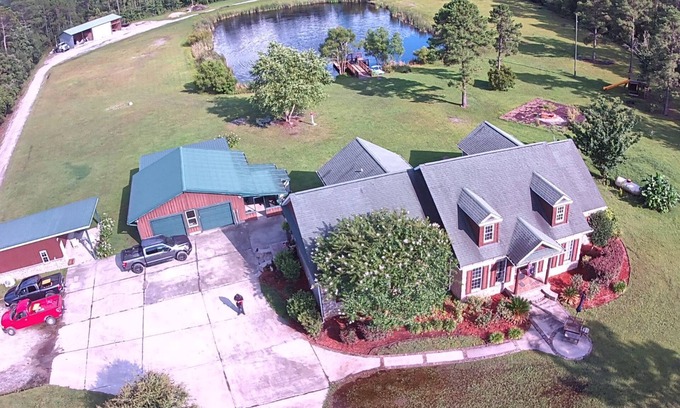 Ellabell Cabin | Cozy fishing cabin with stocked pond, near Savannah. Fenced- pet friendly!