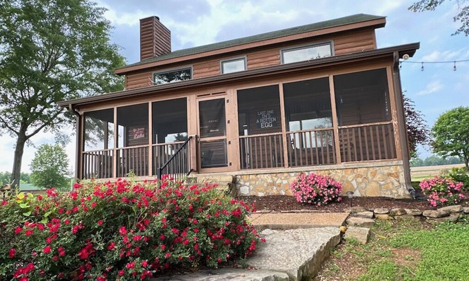 Town Creek Cabin | Cozy Lakeside Cabin w/Private Doc, Pool, & Screened In Porch!