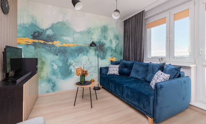 Emaus Apartment | Cozy Pastel Studio in Gdańsk by Renters