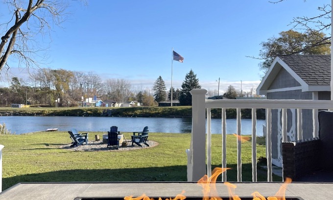 Oscoda Cottage | Cozy riverfront cottage with an easy beach-inspired coastal MI vibe!