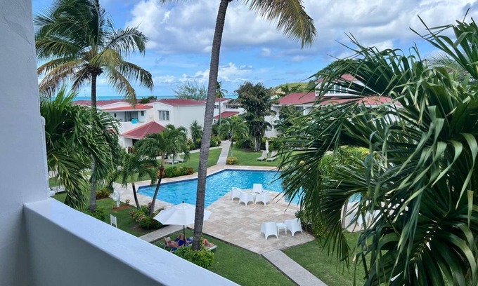 Dickenson Bay Condo | Cozy Seaside studio condo with Balcony, AC and WiFi in awesome Antigua