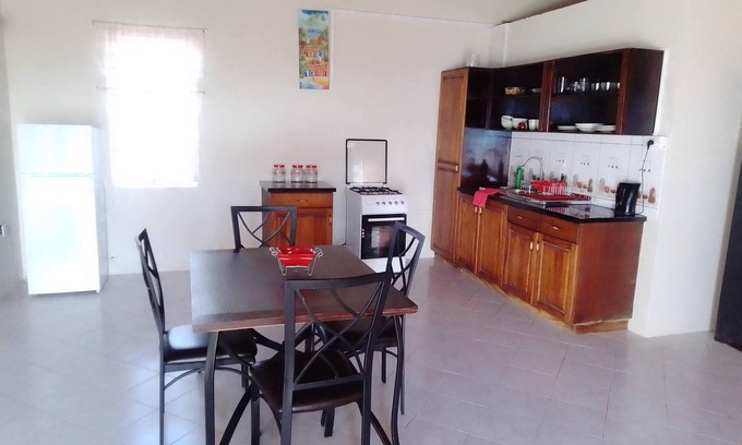 Roseau Apartment | Cozy studio apartments with beautiful garden and ocean view. Self contained.