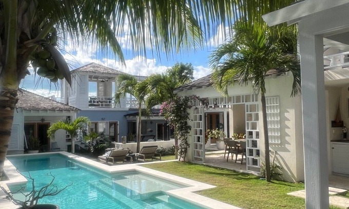 Dunmore Town House | Crown Affair: Village Compound on Charming Lane with 40' Pool & Sunset Views