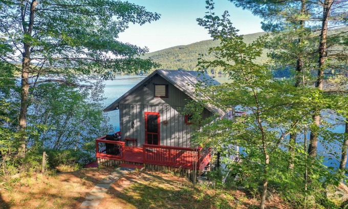 Moultonborough House | Darling studio over boathouse on Lake Kanasatka