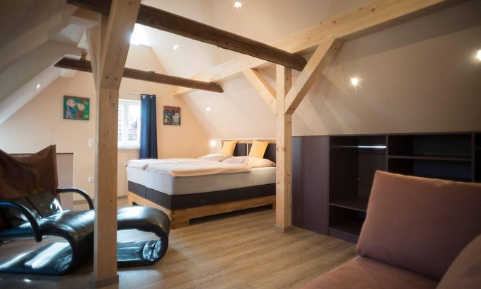 Marktheidenfeld Apartment | Der einstige HEUSCHOBER in der Hofstallung, 2-geschossiges Deluxe-Maisonette-Apartment