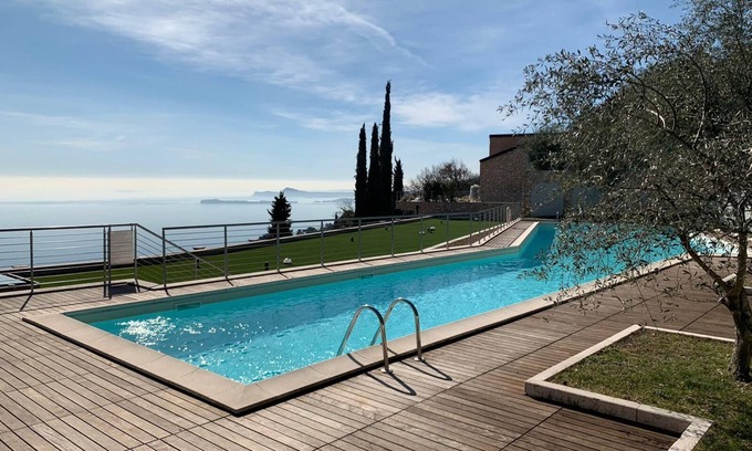 Toscolano Maderno Apartment | Design apartment - 100 sqm green terrace - Pool - Fantastic panoramic lake view