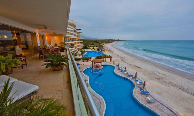 Emiliano Zapata Condo | DIRECTLY on the Beach, Luxury and Comfort! Perfect for your family.