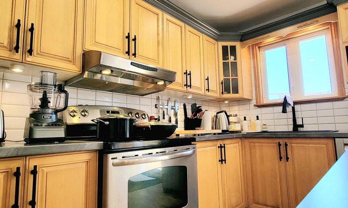 Saint-Godefroi House | "Discover Stunning Views & Relaxation at Au Chant de la Rivière, Gaspésie"