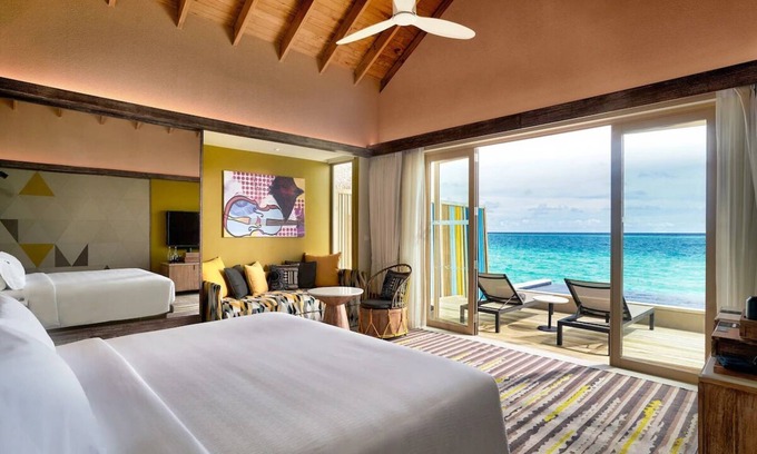 Farukolhufushi Island Hotel | Dive into Music: Overwater Villas & Underwater Tunes Await You!