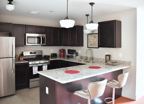 Aurora Apartment | Downtown Aurora River Facing Gem