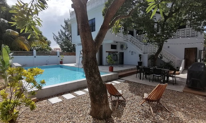 Dangriga House | Downtown Dangriga. Entire property. Private pool. Sleeps 20. Handicap Accessible