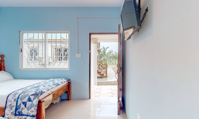 Dangriga Apartment | Eco-friendly cabana, Belize green lodging, Dangriga hidden gem