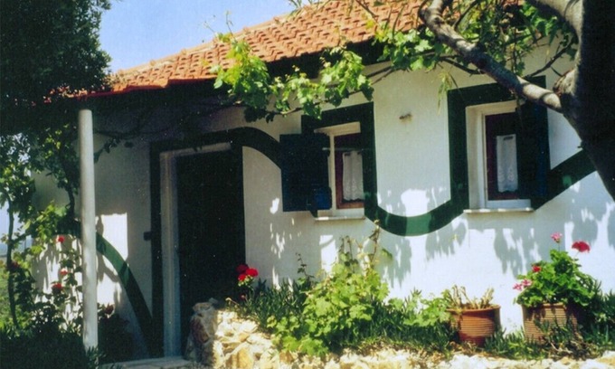 Petrochori House | Eco friendly cottage in large rambling garden. 400m walk to the sea.