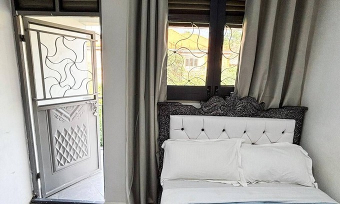 Entebbe Hotel | Economy Standard Room Entebbe with Nature View Balcony