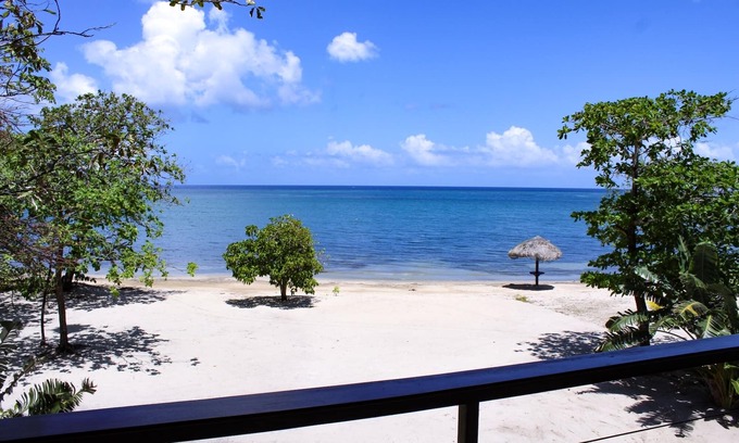 Palmetto Bay Villa | Elegant Custom Beachfront Villa With Floor To Ceiling Glass Walls, 180 Sea-View