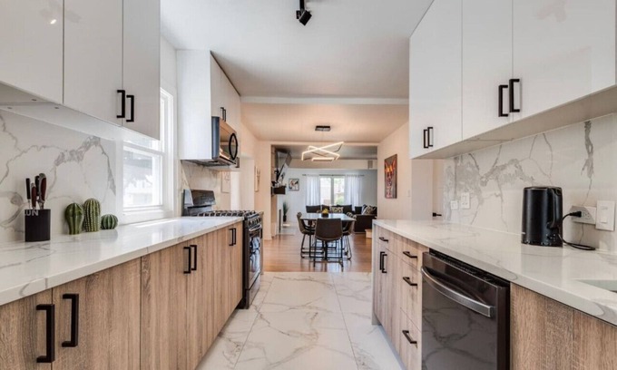 Elmhurst House | Elegant Haven: 4BR/3BA Retreat