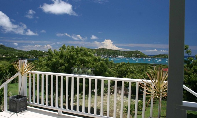Falmouth Harbour House | Elegantly-Designed Artist's Home set in Tropical Gardens with Stunning Sea View