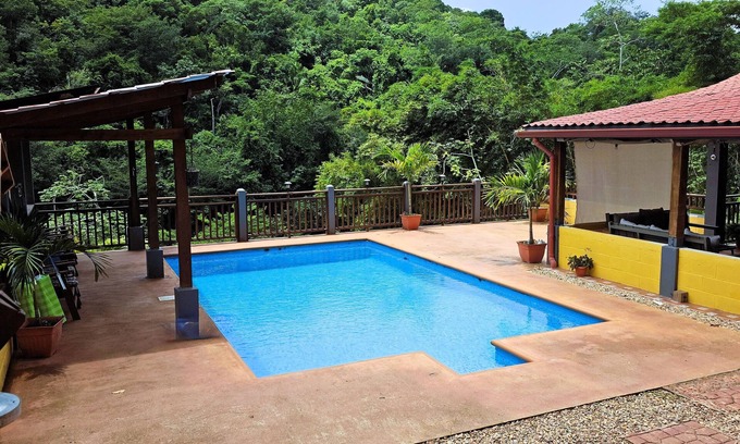 San Ignacio House | Enchanting Riverside Jungle Village Bungalow: Pool, A/C, WiFi, TV, Kayaks & More