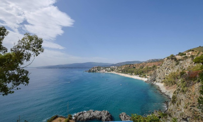 Zambrone Apartment | Enjoy a beautiful sea view in this inviting vacation apartment on the outskirts of Zambrone.