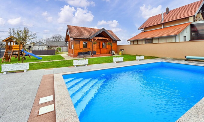 Zasadbreg House | Enjoy a fantastic view of the countryside in this inviting vacation home with pool!