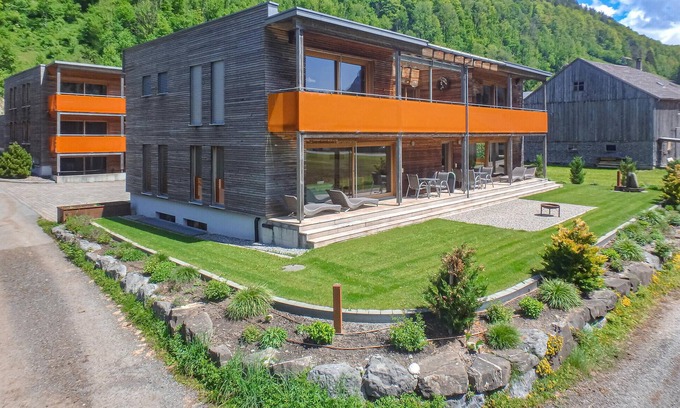 Bizau Apartment | Enjoy a lovely break close to nature in this holiday apartment with access to a pool and sauna.