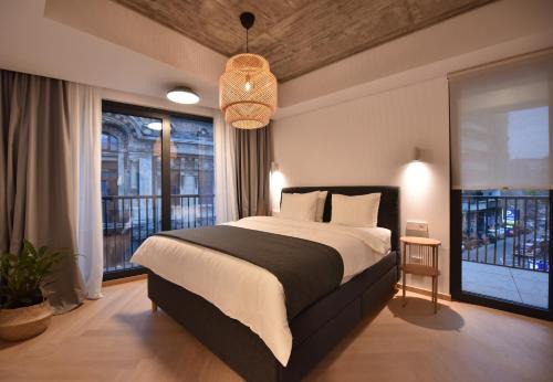 Jibert Apartment | Enjoy a premium downtown apartment in a BRAND-NEW ART DECO BUILDING! Free parking!
