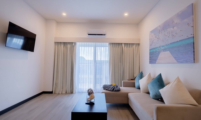 San Pedro Hotel | Enjoy a spacious signature two-bedroom suite with a beach view!