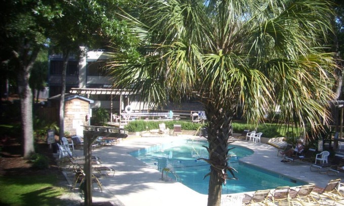 Myrtle Beach Condo | Enjoy breakfast and warm summer breezes on your screened balcony - Summertree