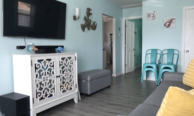 Ortley Beach House | Enjoy sunsets at this modern cottage with large backyard and peekaboo bay view.