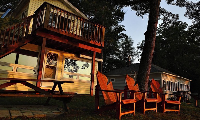 Lupton Cottage | Escape to a cozy cottage on Ausable Lake, in Lupton, Michigan!