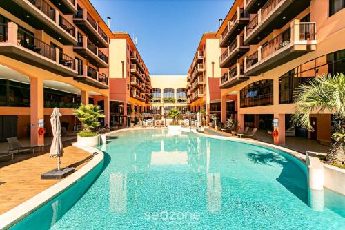 Jurere Resort | Estúdios Modernos em Resort pé na areia - Jurerê Beach Village JBVJR