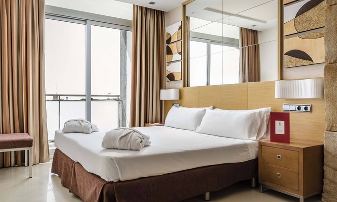 Cunit Hotel | Exe Cunit Suites & Spa