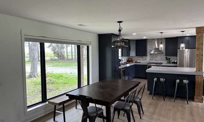 Howell House | Farmhouse in McCrory, Arkansas on 5 acres is a cozy retreat. Witness the Eclipse