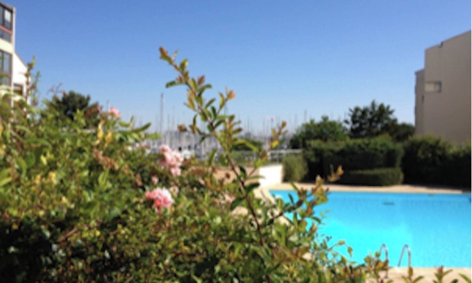 La Rochelle Apartment | Feet in the water between beach and marina.