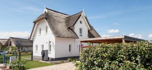 Puddemin House | Ferienhaus Wildrose in der Puddeminer Wiek
