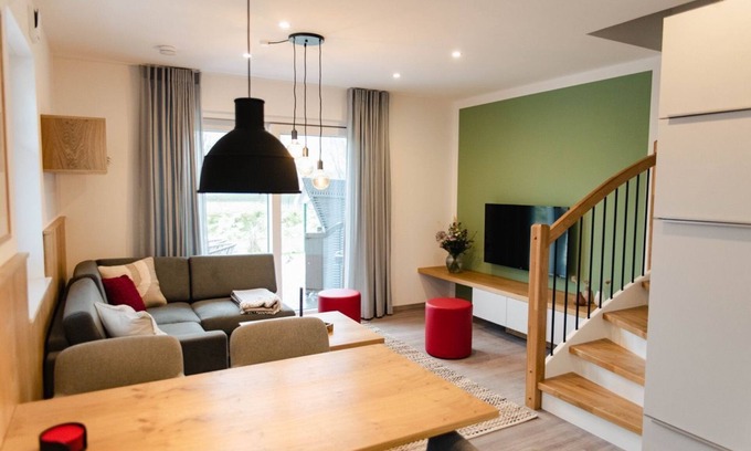 Tannenhausen House | Ferienhaushälfte Straßenseite - Küsten Apartments Tannenhausen