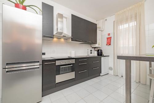 Cesate Apartment | Fiori del Lario Sub6 110 Mq Fiera Rho Milano Como MPX