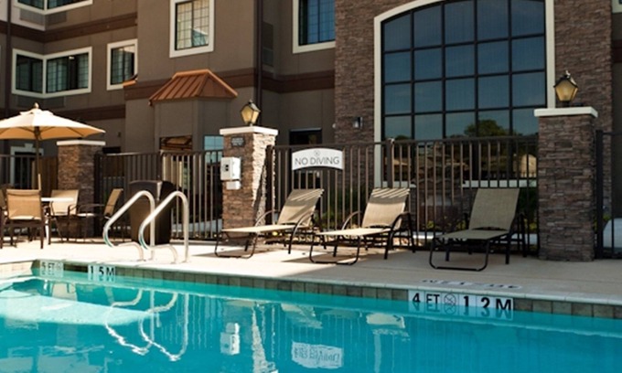 Spring Branch West Condo | Free Breakfast Buffet + Outdoor Pool + 24-Hour Business Center