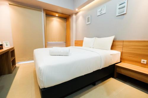 Cikarang Apartment | Furnished Studio No Kitchen Apartment Mustika Golf Residence By Travelio
