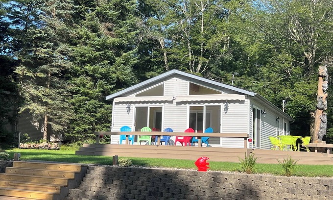St. Helen Cottage | Get away and relax in this Cheerful Waterfront Cottage! Pontoon Included!