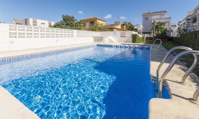Playa de Gandia House | GOLDEN - Chalet with shared pool in Playa de Gandia. Free WiFi