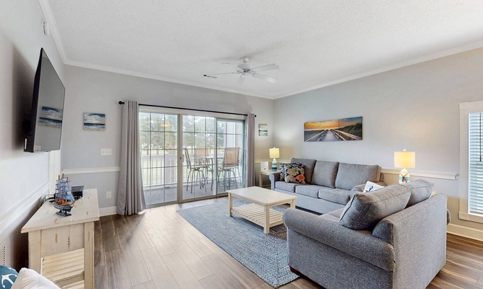 Central Myrtle Beach Condo | Golf course view condo with private balcony, W/D, pool & close to beach