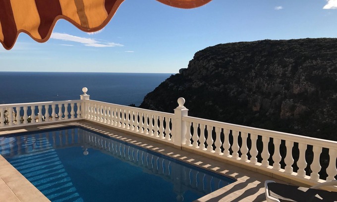 Cumbre del Sol Villa | Gorgeous 5 Star Villa with Fabulous Sea & Mountain Views, Heated Pool & AirCon!