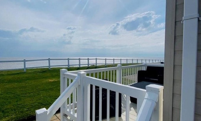 Hopton on Sea House | Gorgeous 7 berth caravan with decking and full seaviews at Hopton ref 80053S